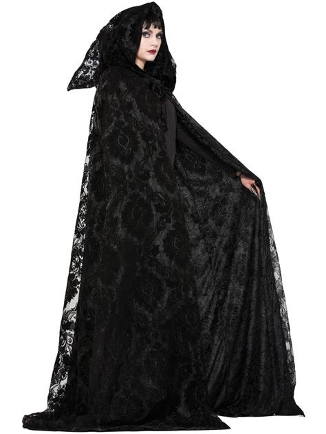 Halloween witch in black cloak